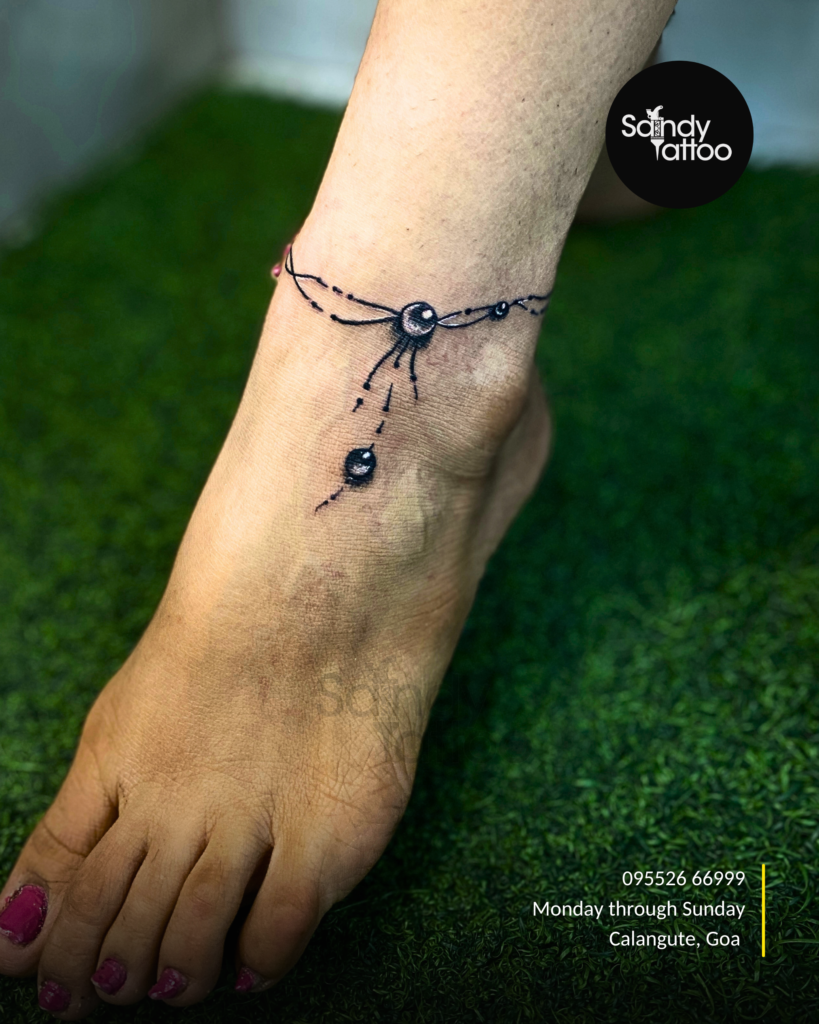Custom ornamental forearm tattoo created by Sandy Tattoo Studio in Calangute, Goa.